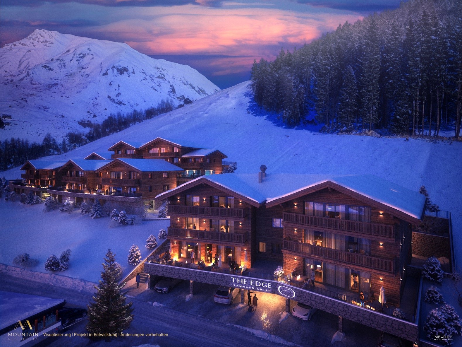 Alpine-Resort in Winterlandschaft bei Sonnenuntergang