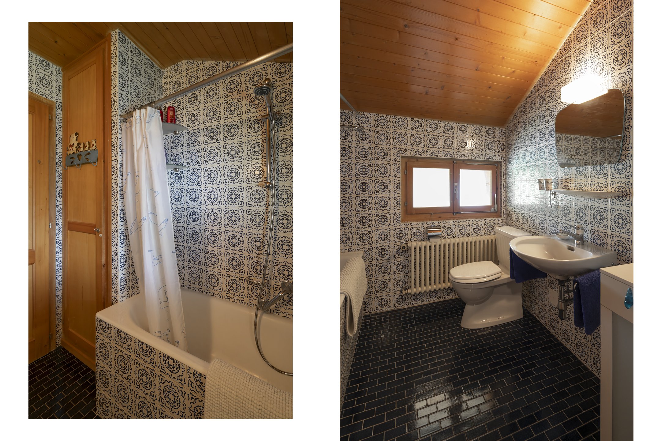Badezimmer mit Holzdecke und blau-weißem Fliesenmuster