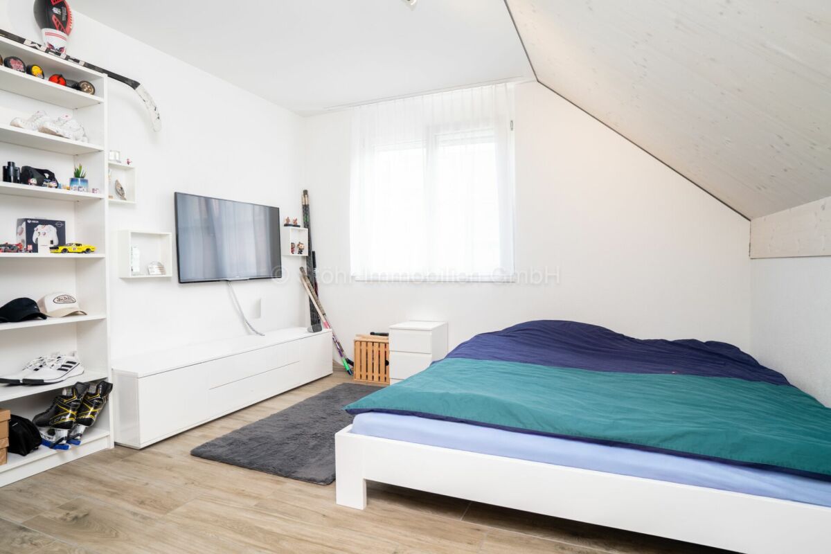 Schlafzimmer unter Dachschräge