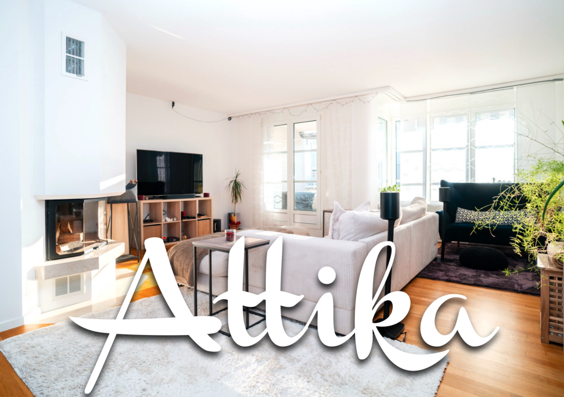 Wohnzimmer mit Kamin und großer Fensterfront