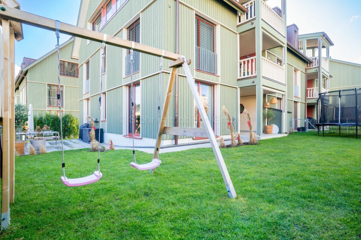 Wohnanlage mit Spielbereich und Innenhofgarten