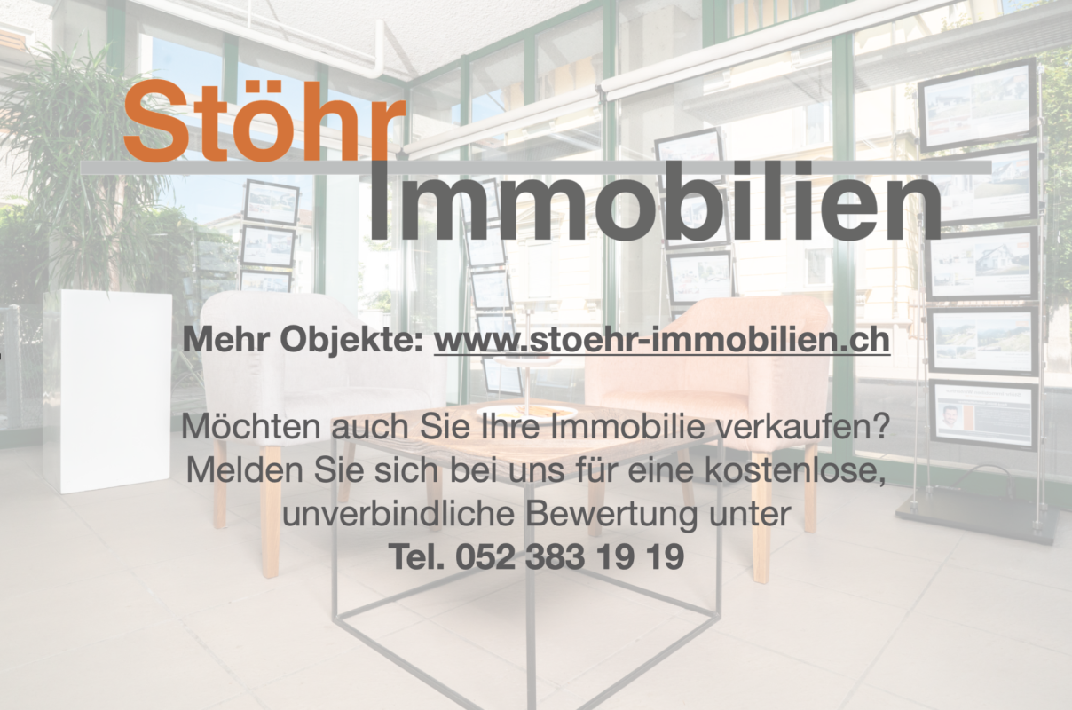 Büro-/Ausstellungsraum mit großem Immobilien-Branding