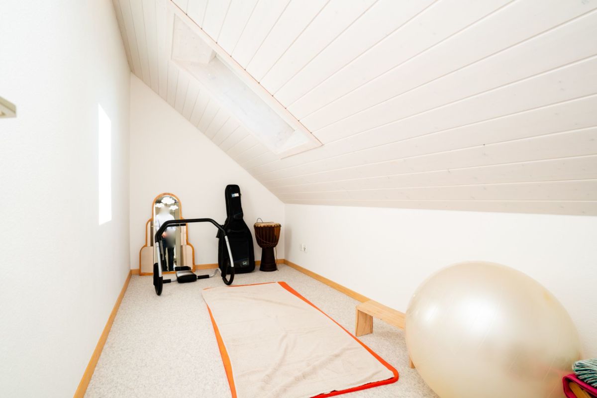 Dachgeschossraum mit Fitnessbereich