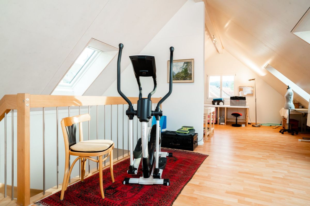 Dachgeschoss mit Fitness- und Arbeitsbereich