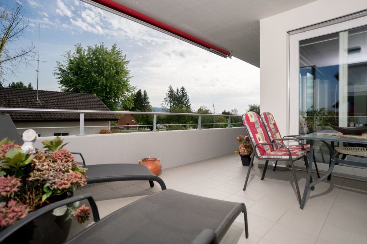 Überdachte Terrasse mit Sitzbereich