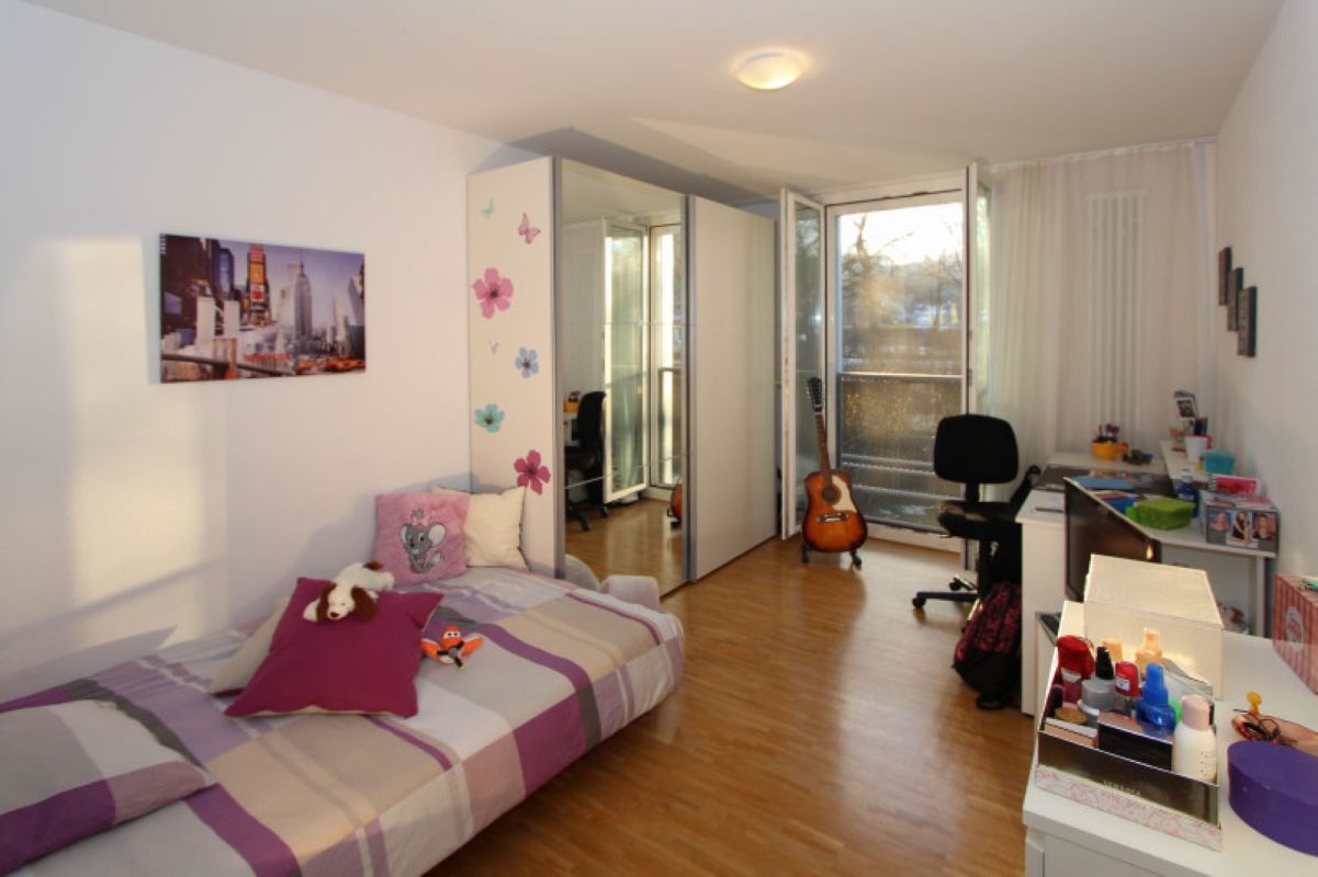 Schlafzimmer mit Balkonzugang