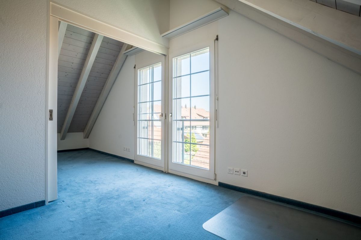 Ausgebauter Dachraum mit Balkonfenstern