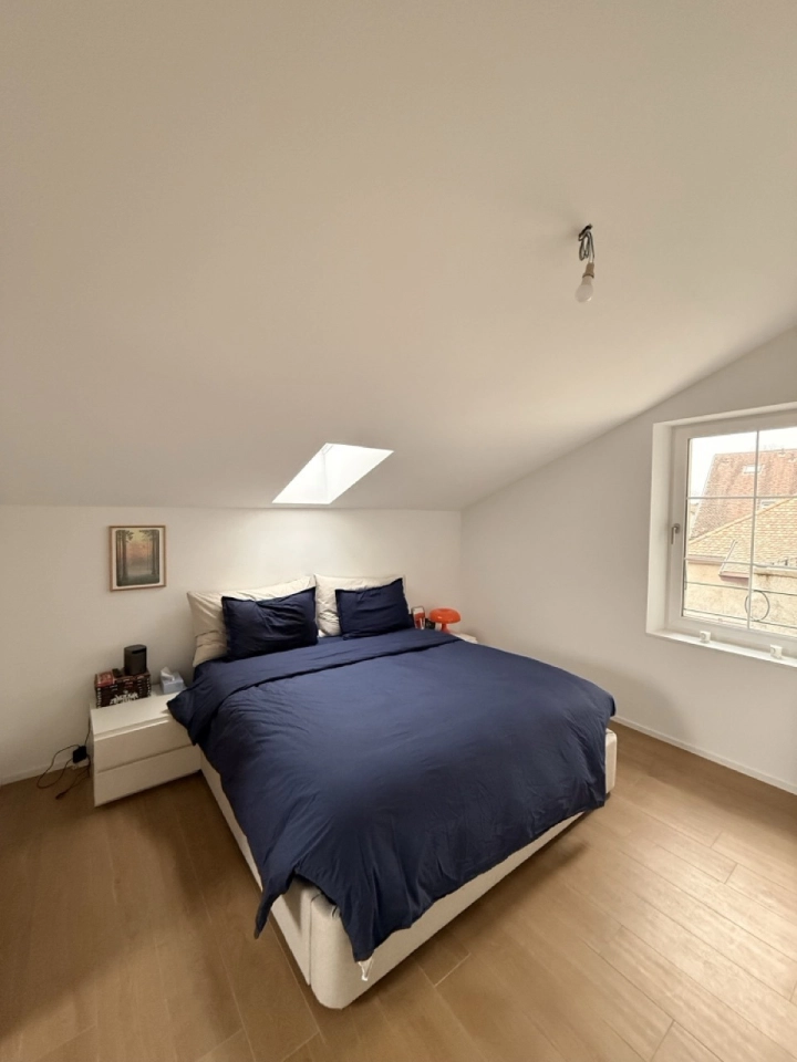 Schlafzimmer unter Dachschräge