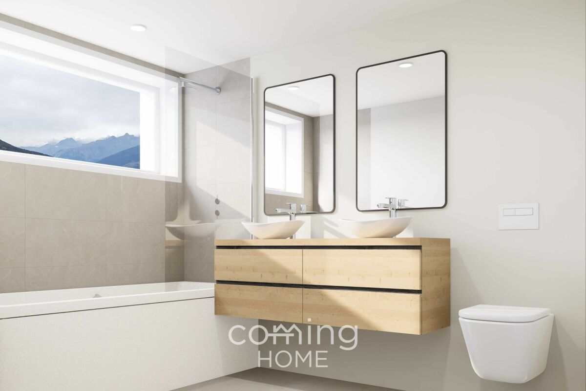 Modernes Badezimmer mit Doppelwaschtisch und Badewanne