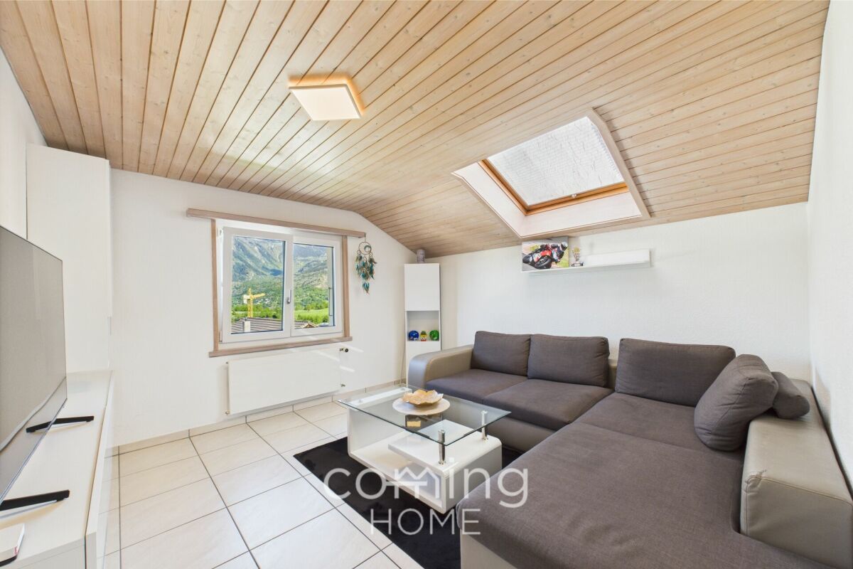 Dachgeschoss-Wohnzimmer mit Schrägdecke
