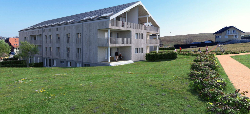 Mehrfamilienhaus in grüner Umgebung