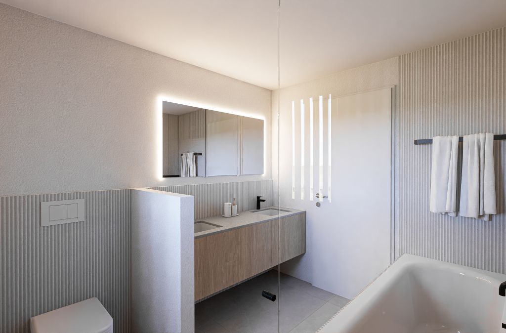 Modernes Badezimmer mit LED-Spiegel und Badewanne