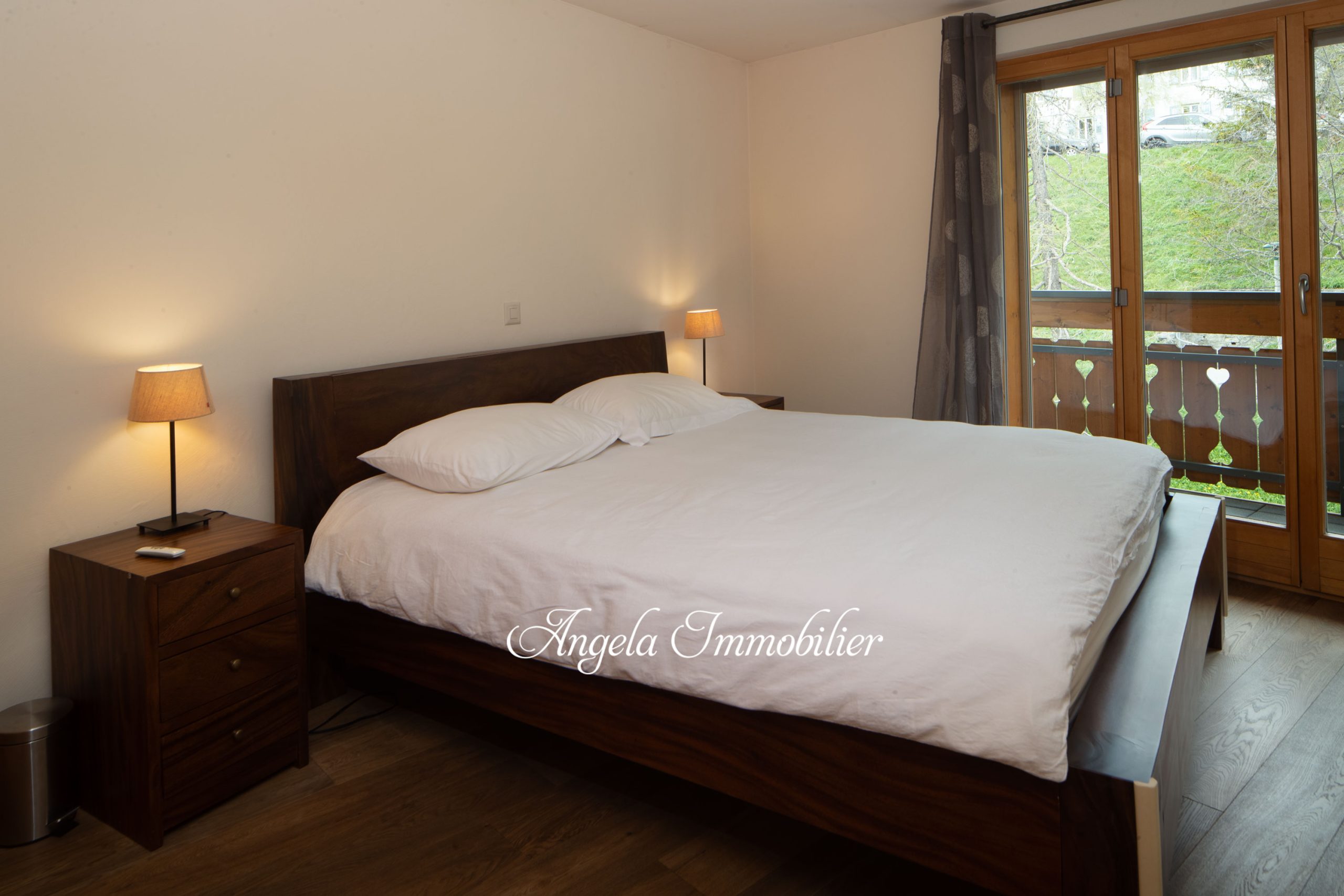 Schlafzimmer mit Balkonblick