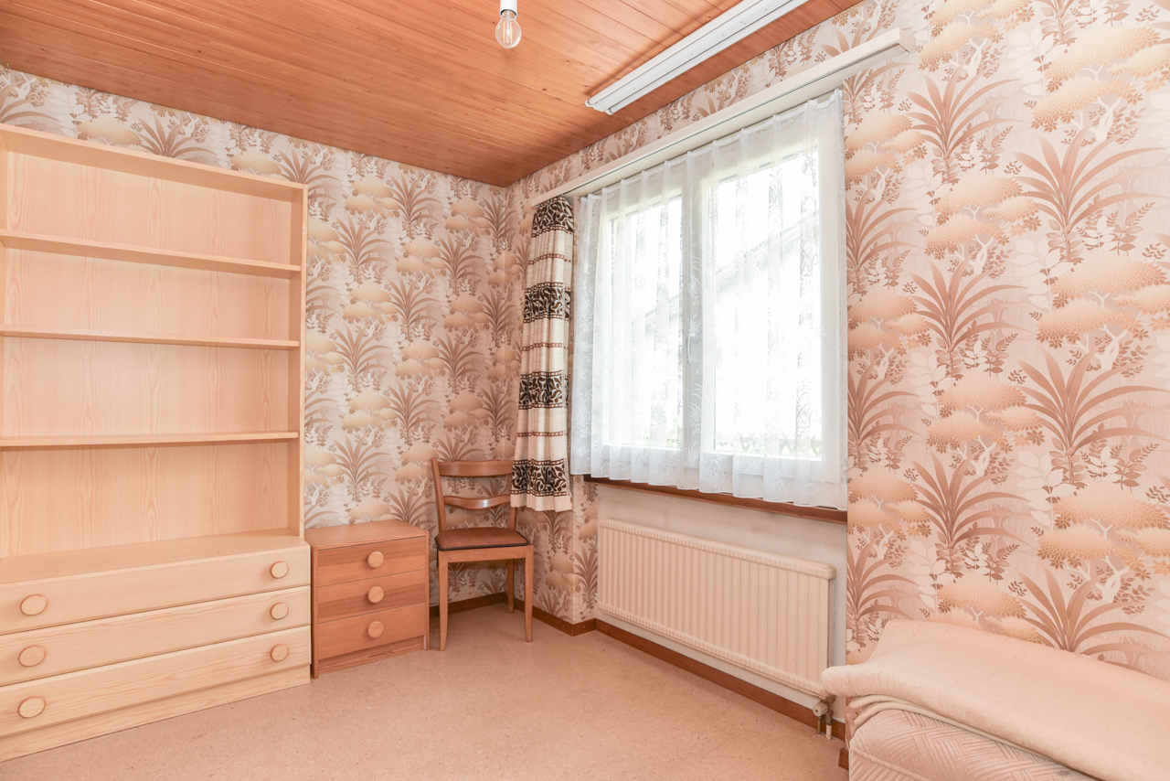 Schlafzimmer mit Vintage-Tapete