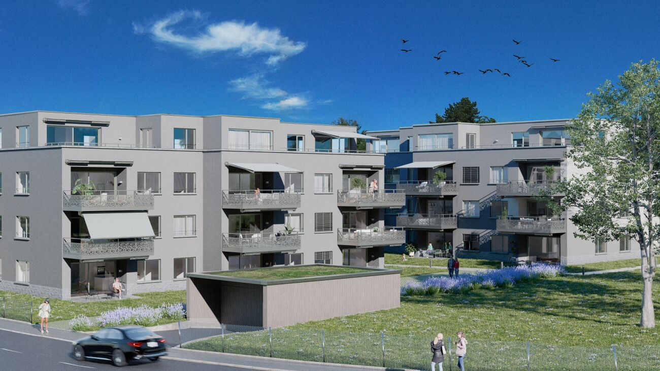 Mehrfamilienhaus mit begrüntem Außenbereich