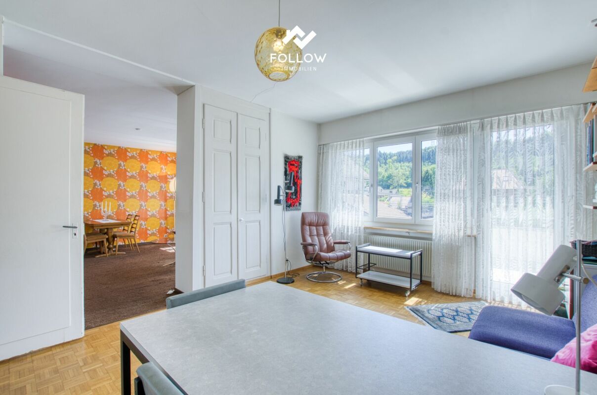 Wohnzimmer mit angrenzendem Essbereich