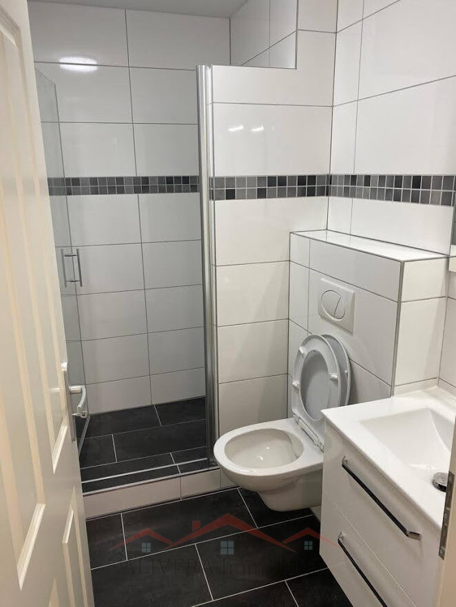 Attraktive Renditeimmobilie: Modernisiertes Mehrfamilienhaus mit 4 Wohneinheiten – Basel