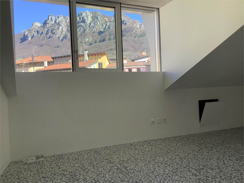 Dachgeschosszimmer mit Bergblick