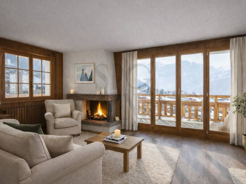 Gemütliches Wohnzimmer mit Kamin und Bergblick