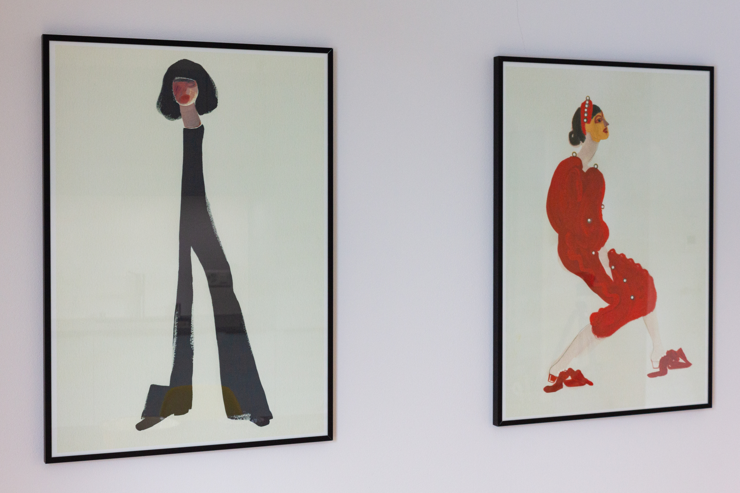 Wandkunst mit zwei gerahmten Illustrationen