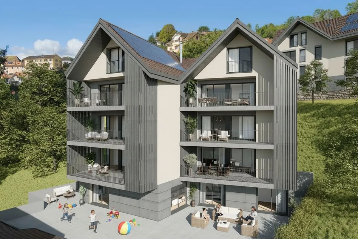 Moderne Wohnanlage mit Giebeldächern und Balkonen