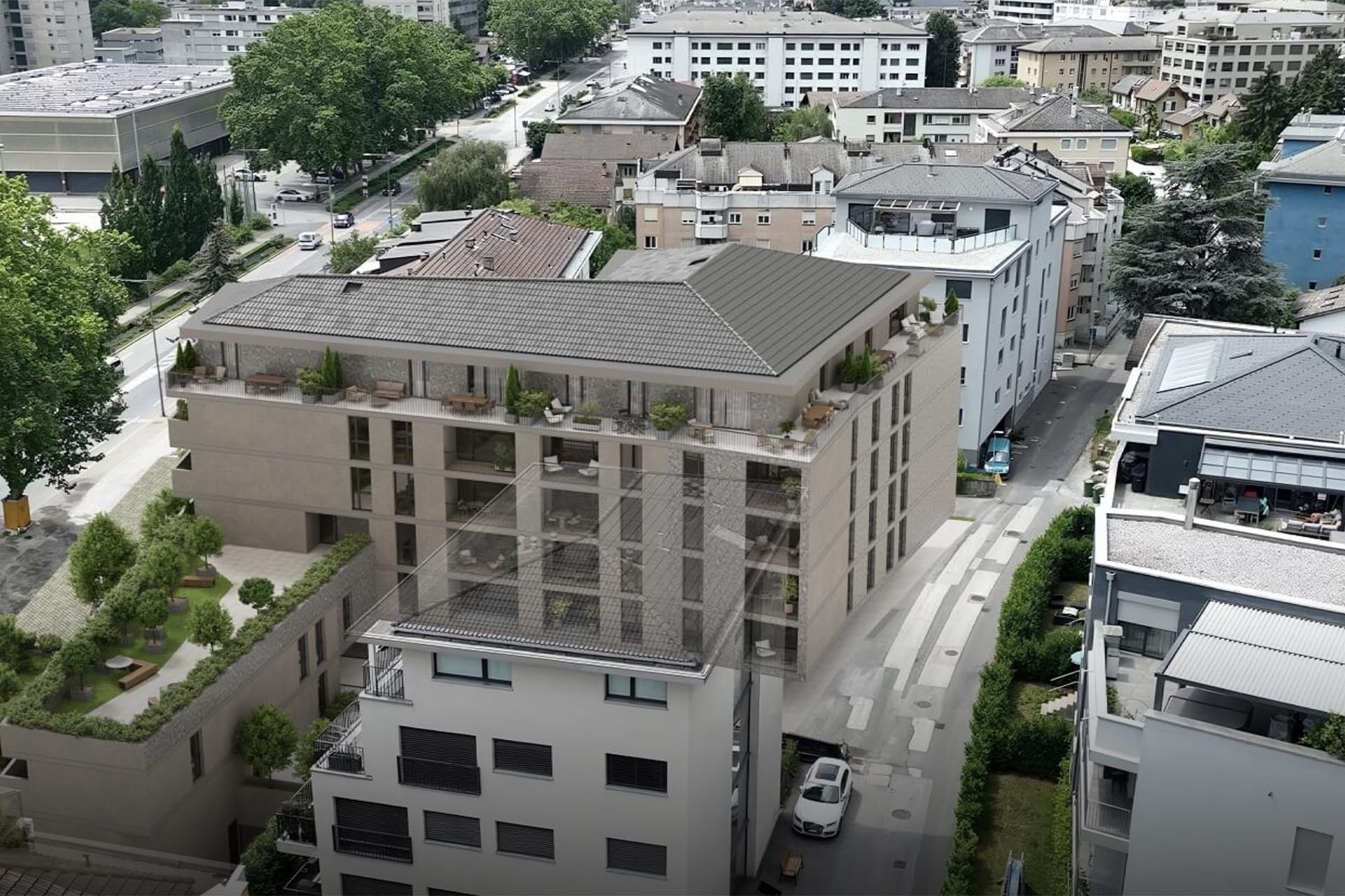 Aerialaufnahme eines modernen Wohngebäudes mit Dachterrassen