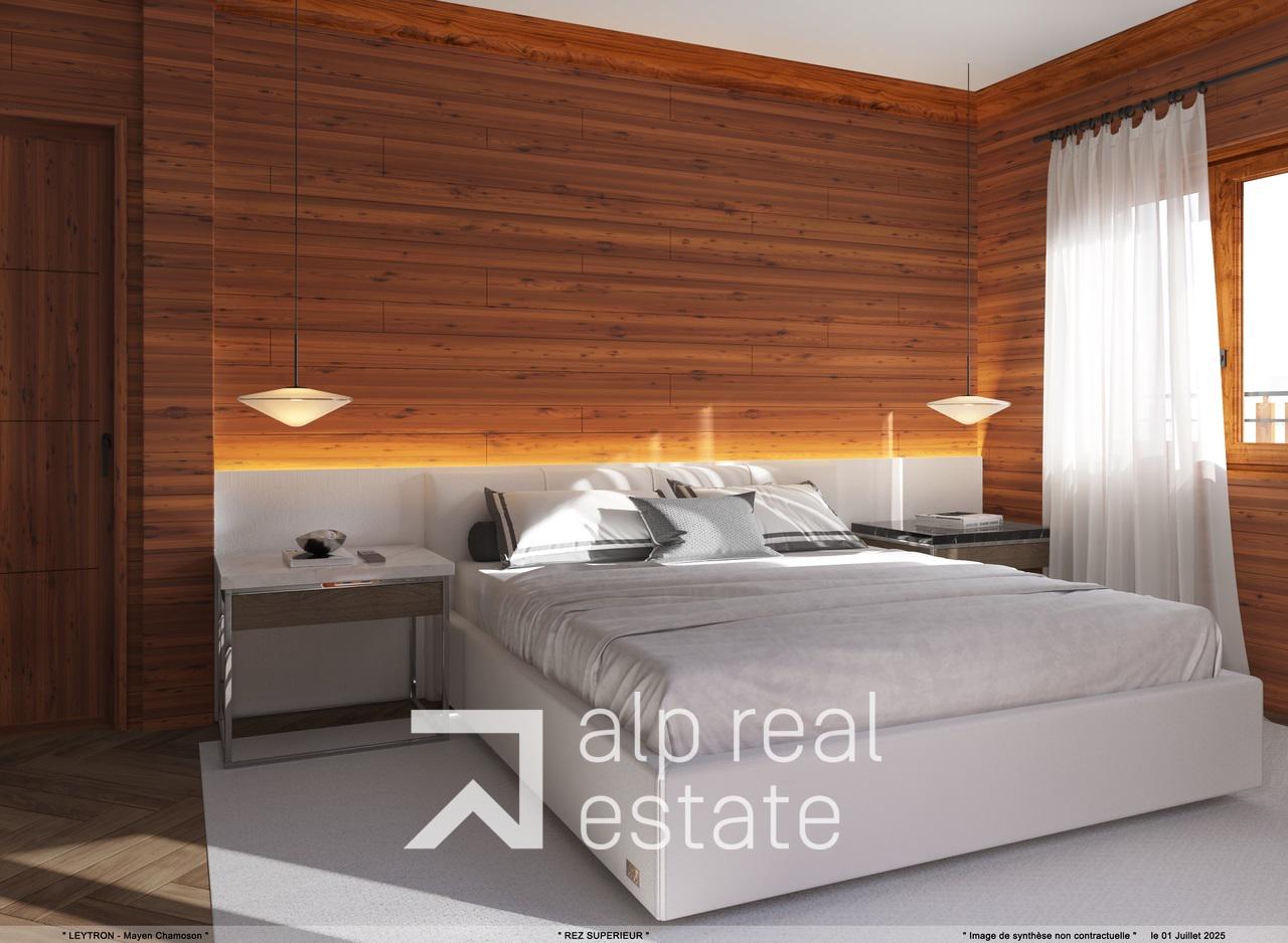 Helles Schlafzimmer mit Holzverkleidung