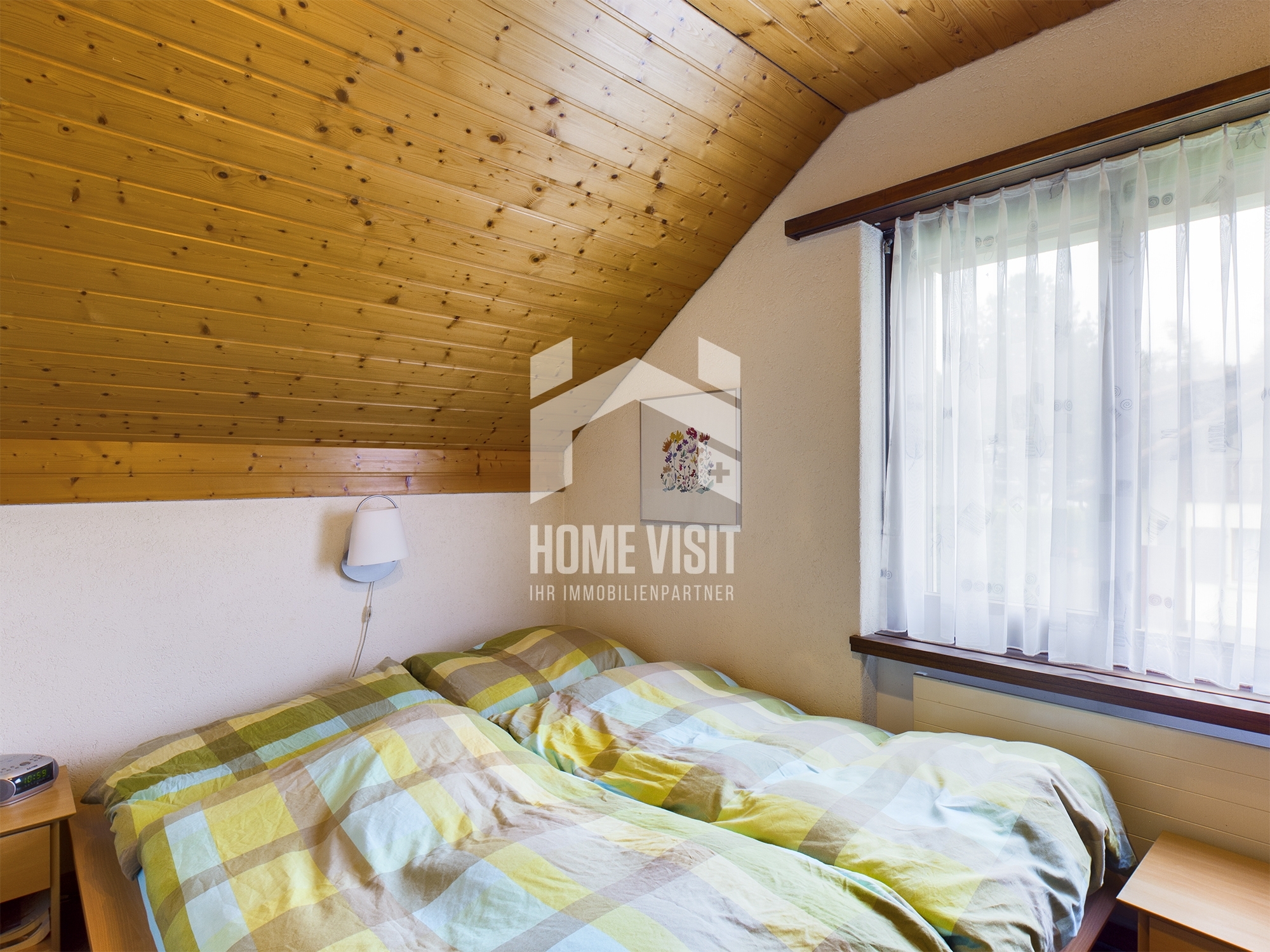Gemütliches Schlafzimmer im Dachgeschoss