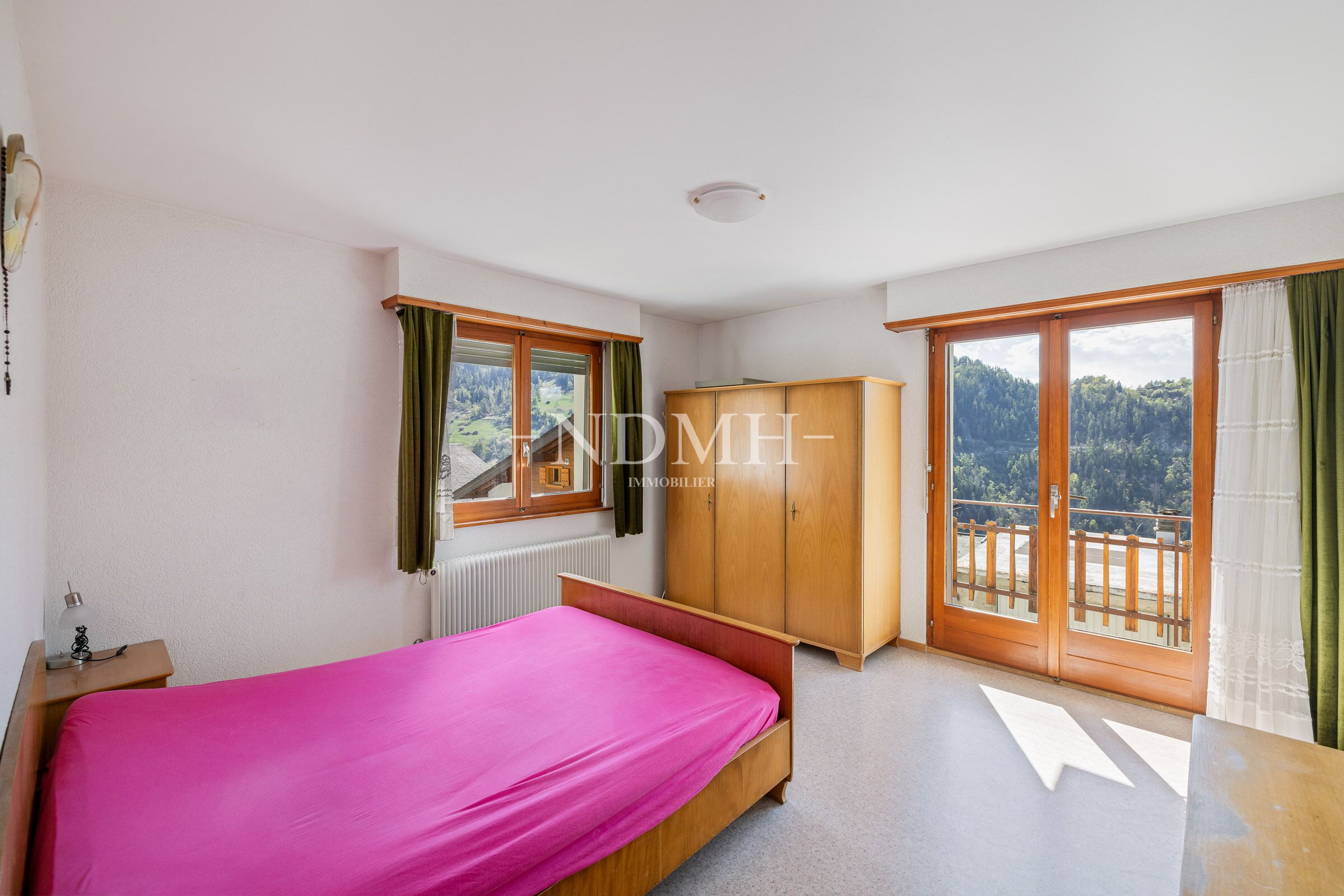 Schlafzimmer mit Bergblick