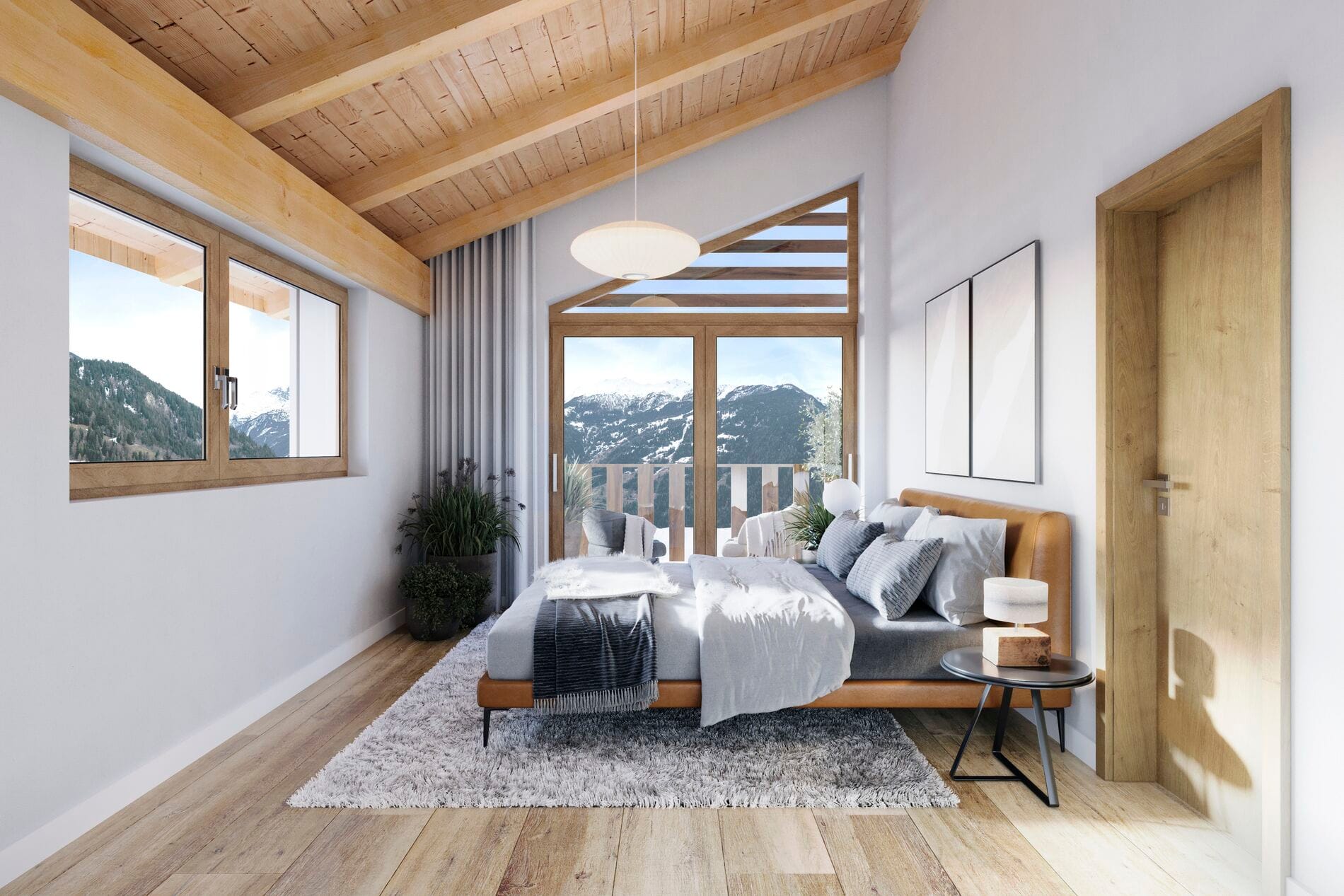 Helles alpines Schlafzimmer mit Bergblick