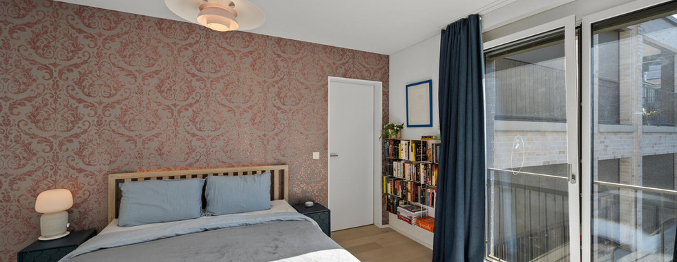 Schlafzimmer mit Balkonzugang