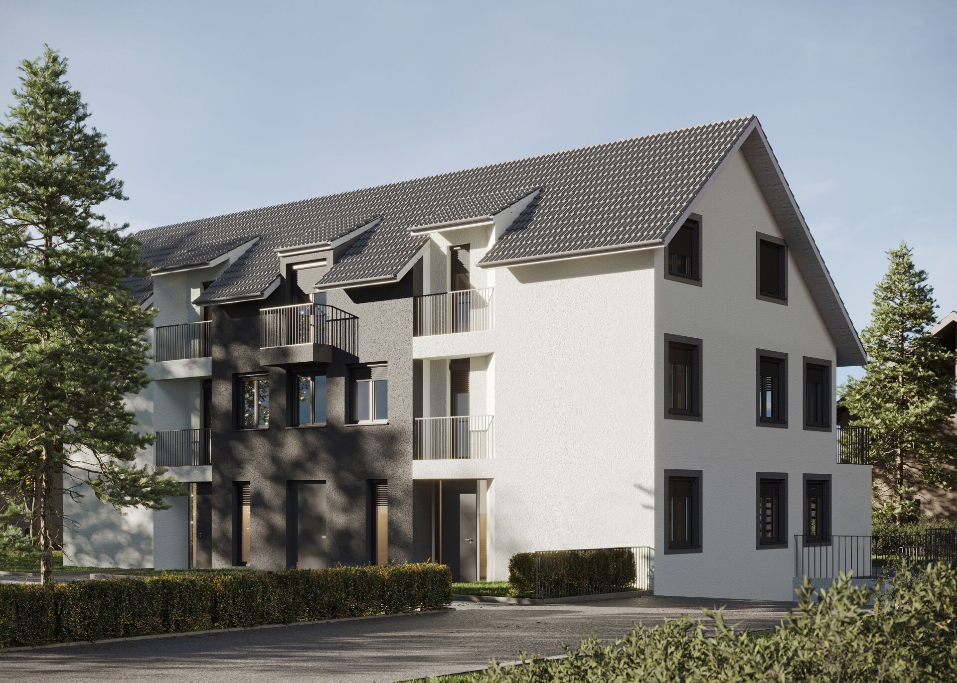 Mehrfamilienhaus mit Satteldach und Balkonen