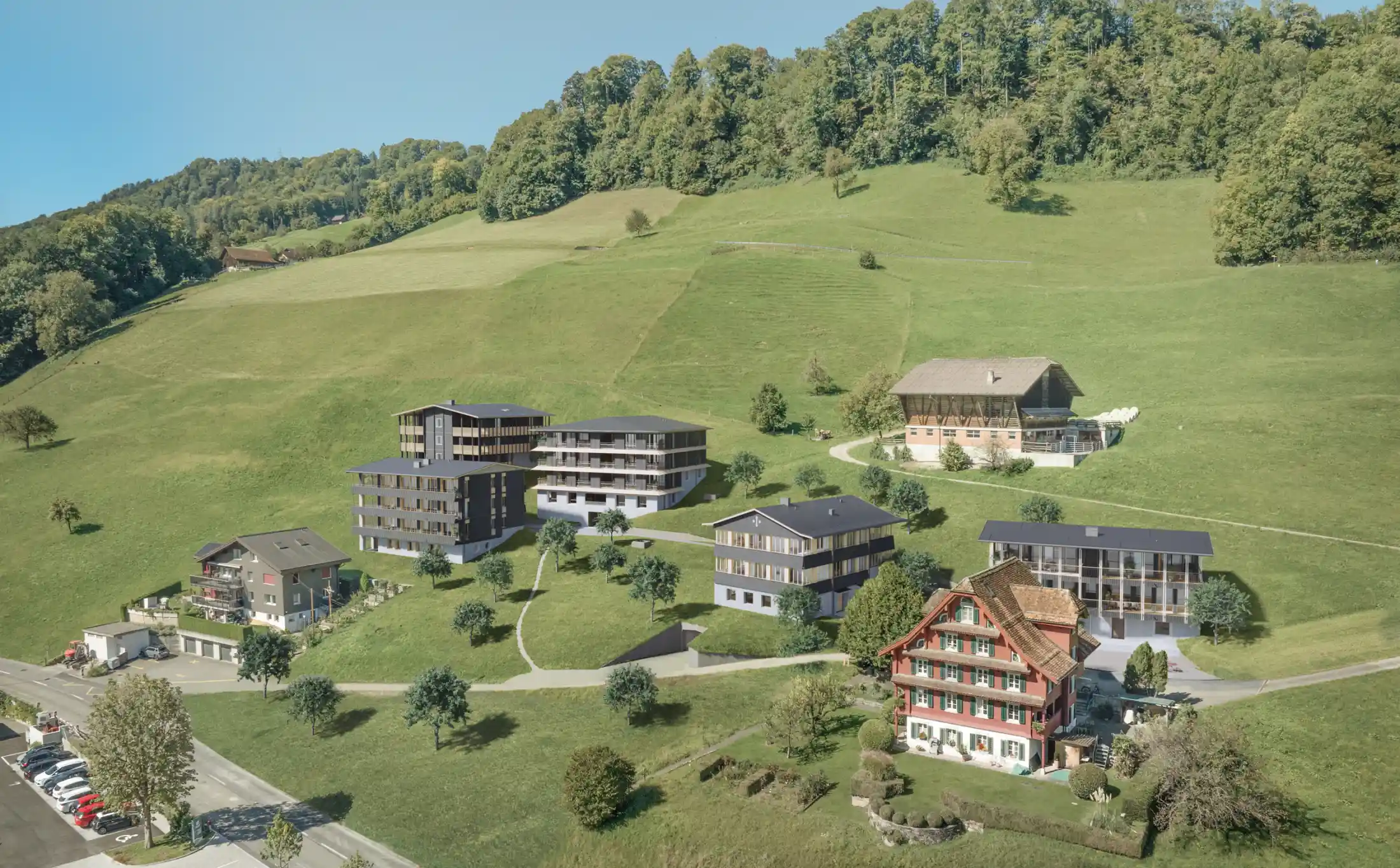 Luftaufnahme einer Hügellandschaft mit Wohngebäuden