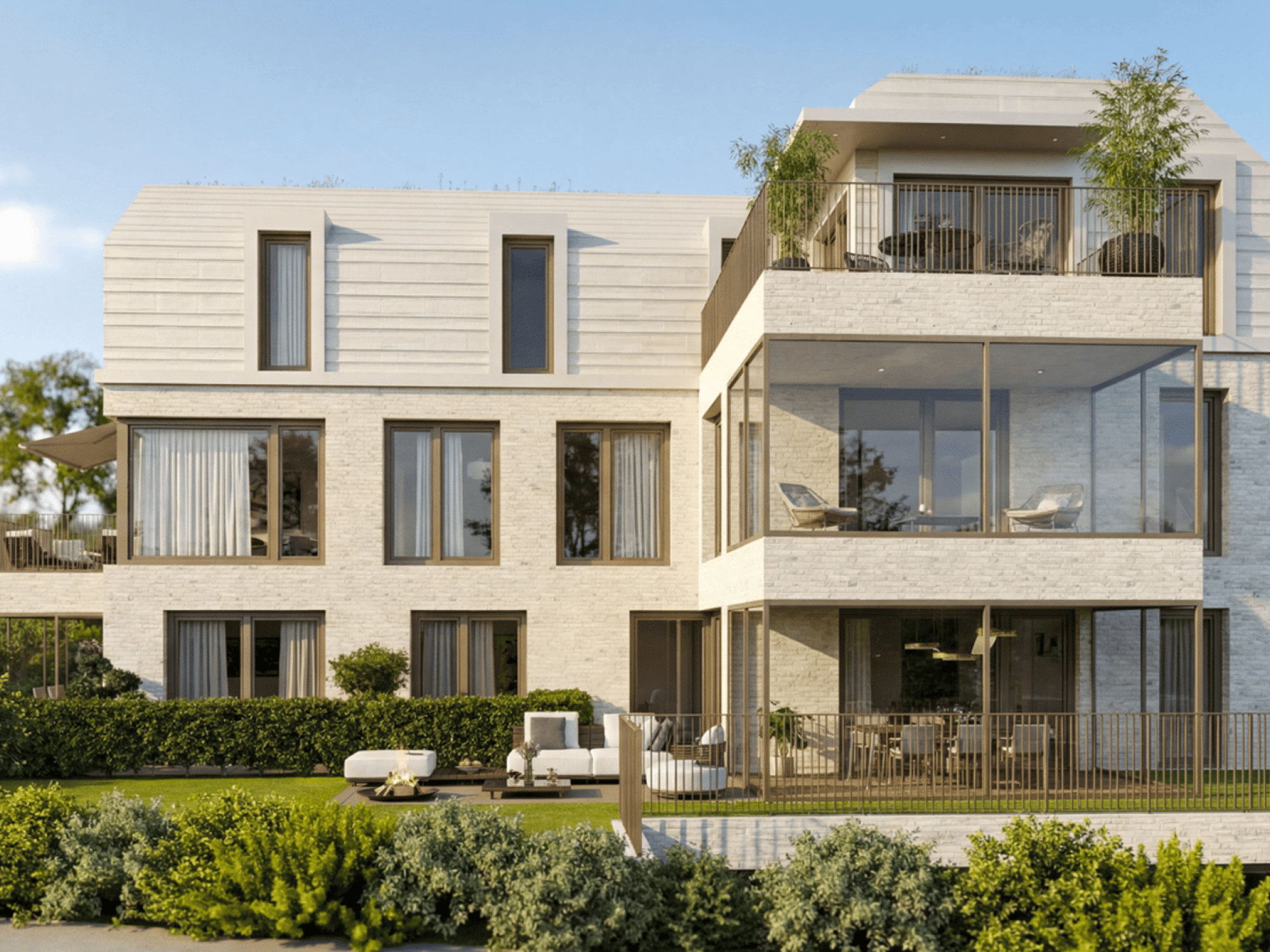 Modernes Mehrfamilienhaus mit großzügigen Balkonen und Garten