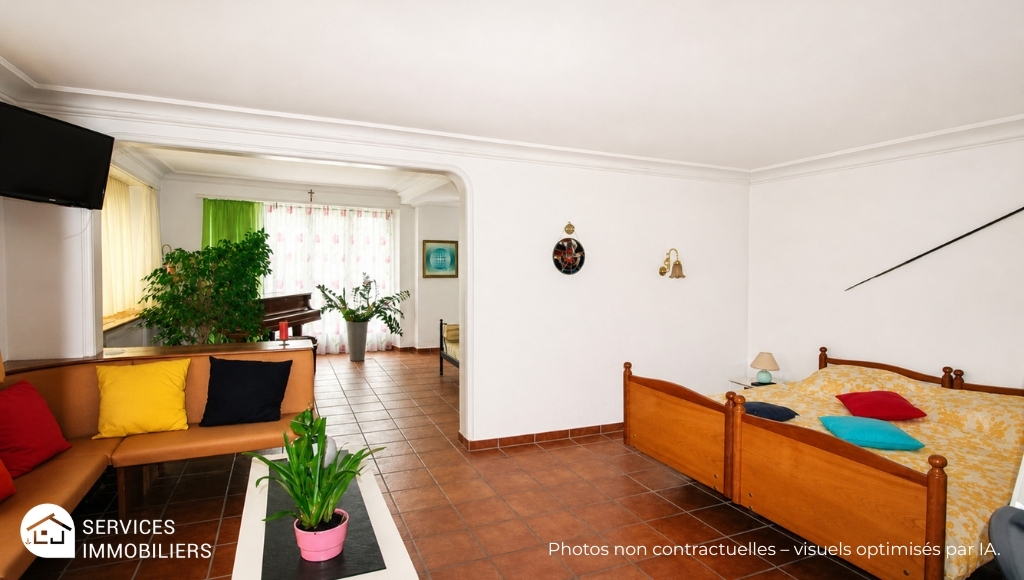 Wohnzimmer mit Schlafbereich
