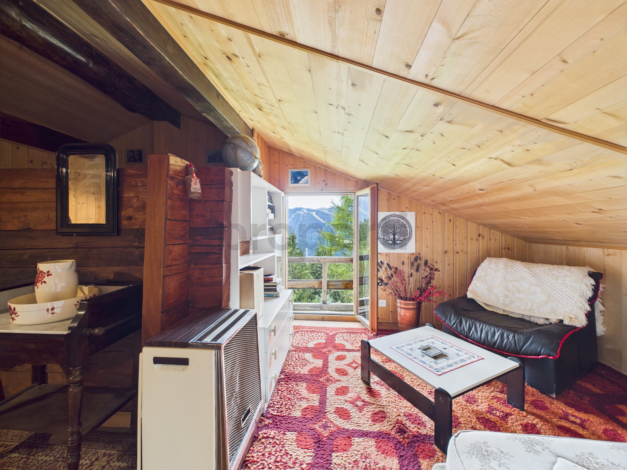 Gemütliches Dachzimmer mit Alpenblick