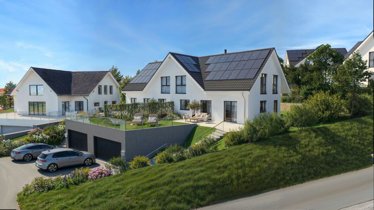 Moderne Einfamilienhäuser mit Photovoltaik und Doppelgarage