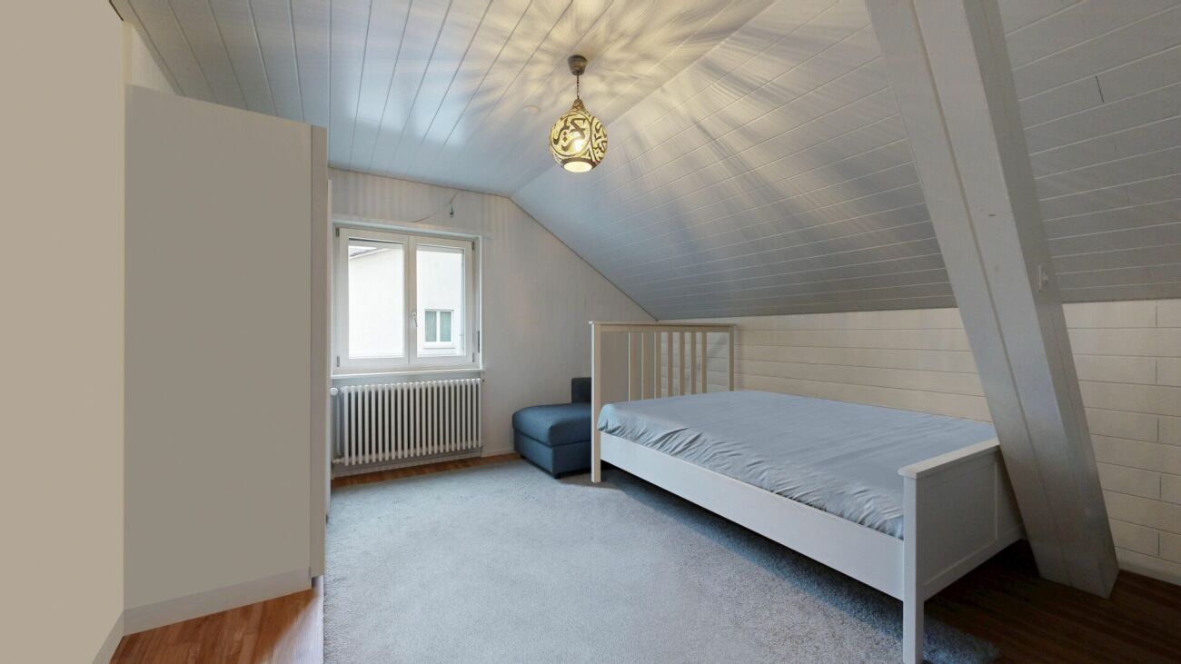 Dachgeschoss-Schlafzimmer mit Einzelbett