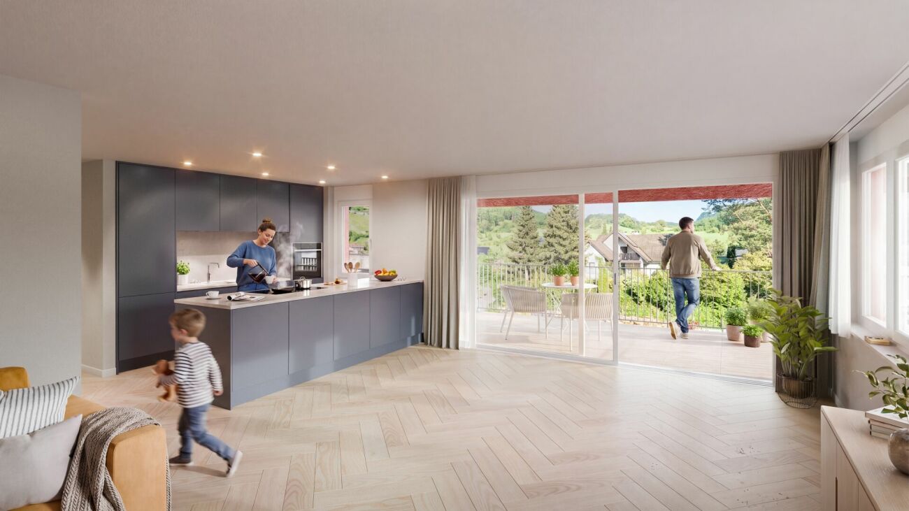 Offener Wohnraum mit Küche und Balkon