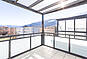 Verglaster Balkon mit Meerblick