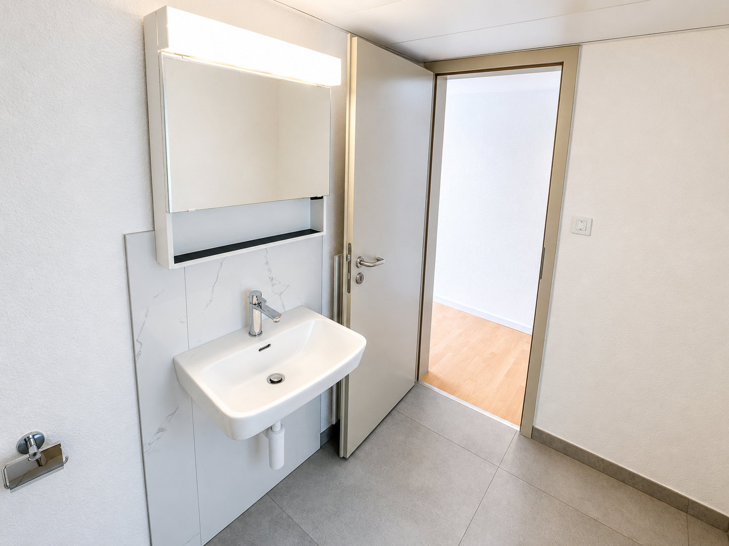 Modernes Gäste-WC mit Waschbecken