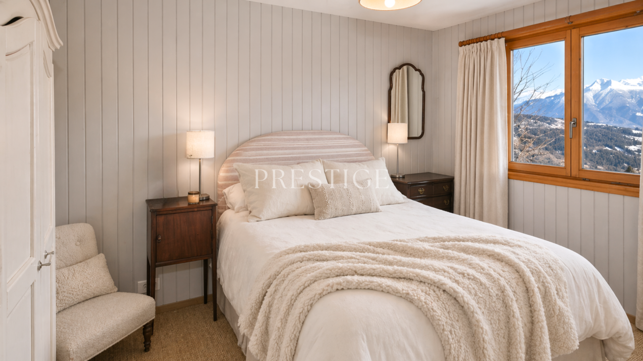 Gemütliches Schlafzimmer mit Bergblick
