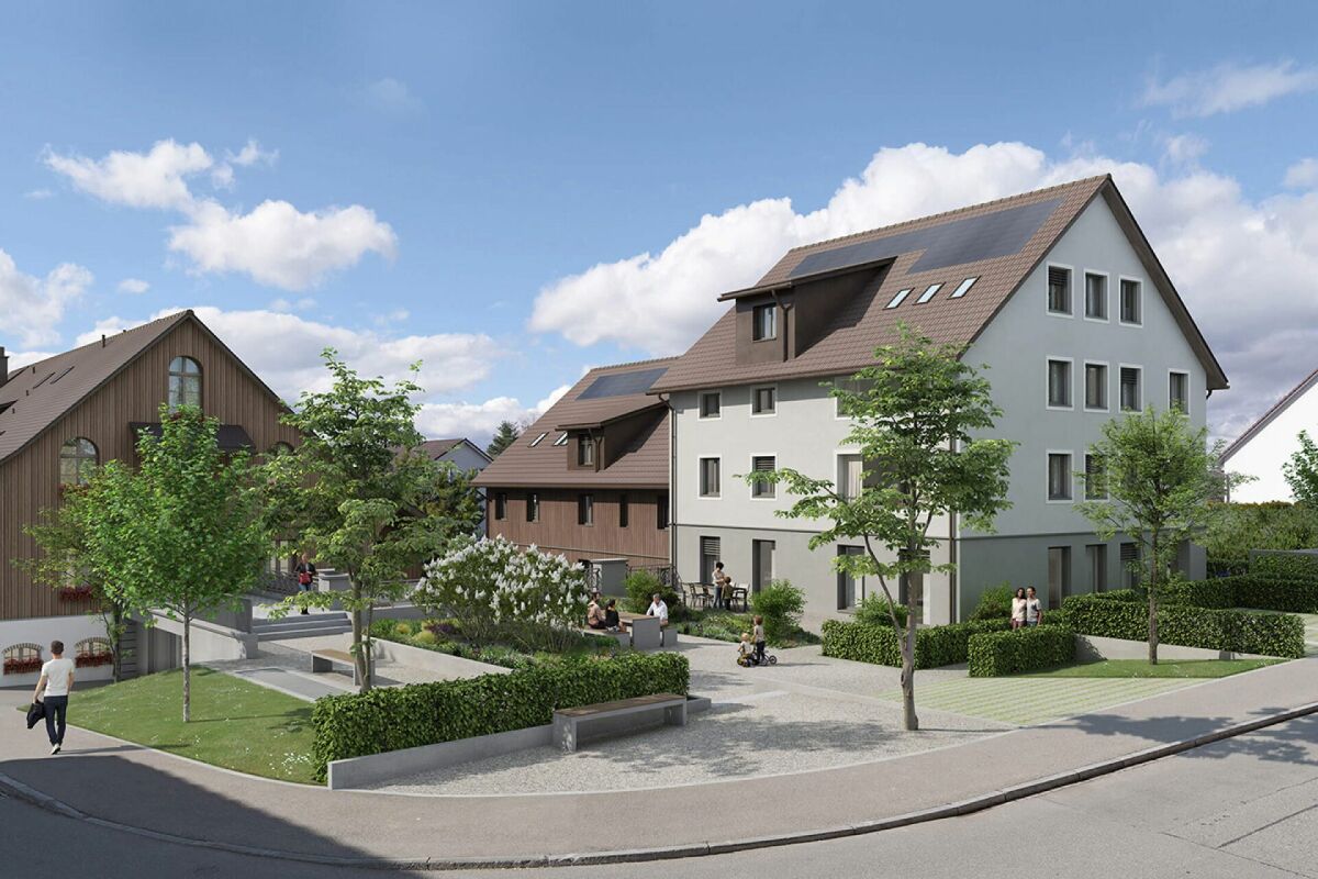 Wohnhausanlage mit begrüntem Innenhof