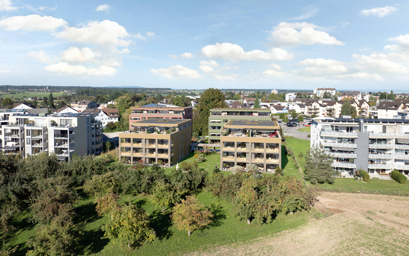 Luftaufnahme eines Wohnquartiers mit Grünflächen