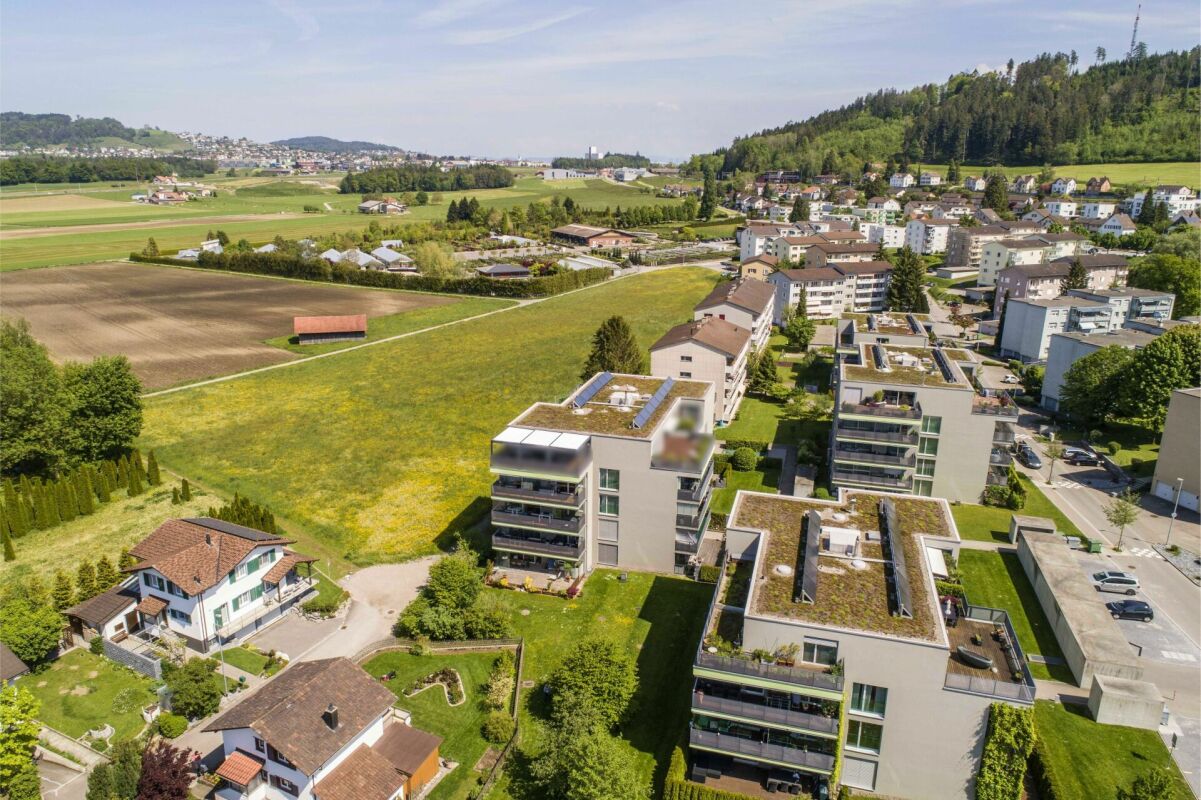 Luftaufnahme eines Wohnquartiers am grünen Stadtrand