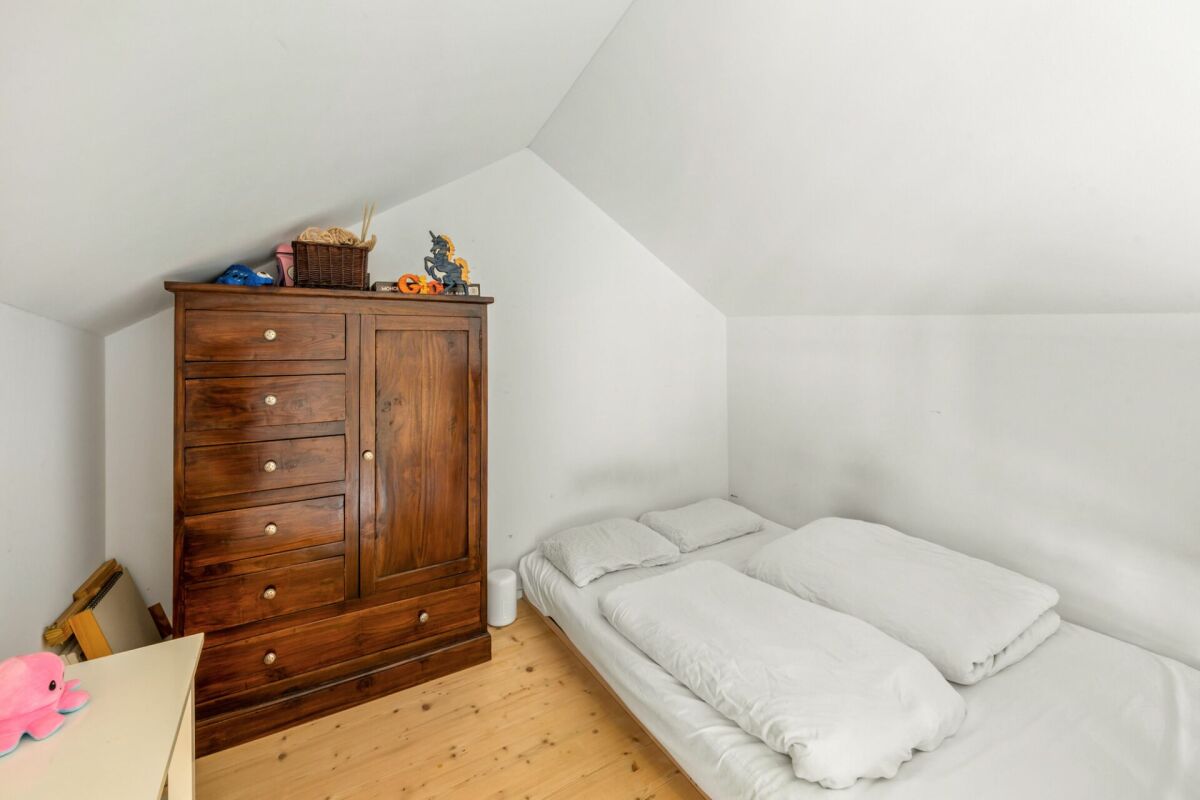 Kleines Schlafzimmer im Dachgeschoss
