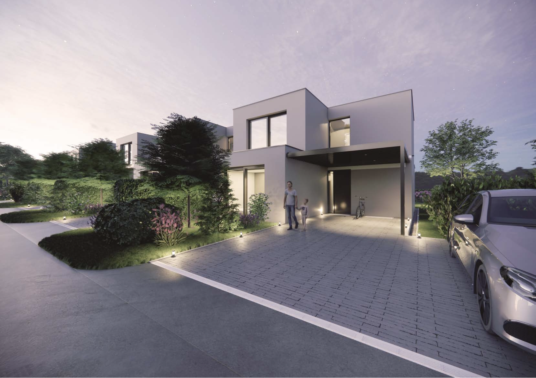 Modernes Einfamilienhaus mit Zufahrt bei Dämmerung