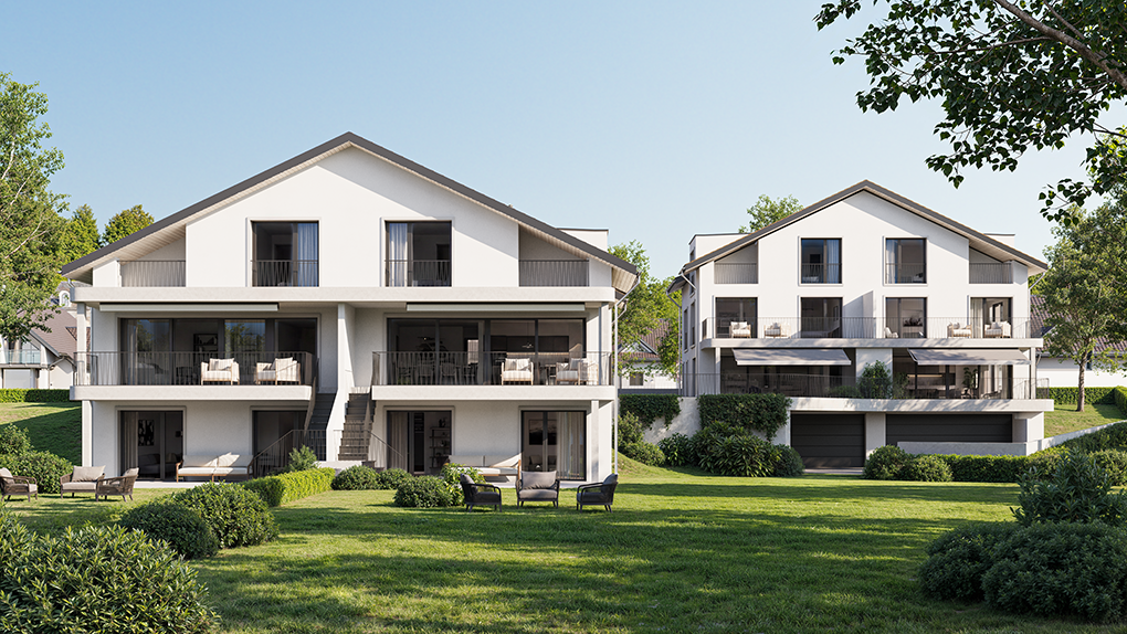 Moderne Wohngebäude mit großen Balkonen und Gartenanlage