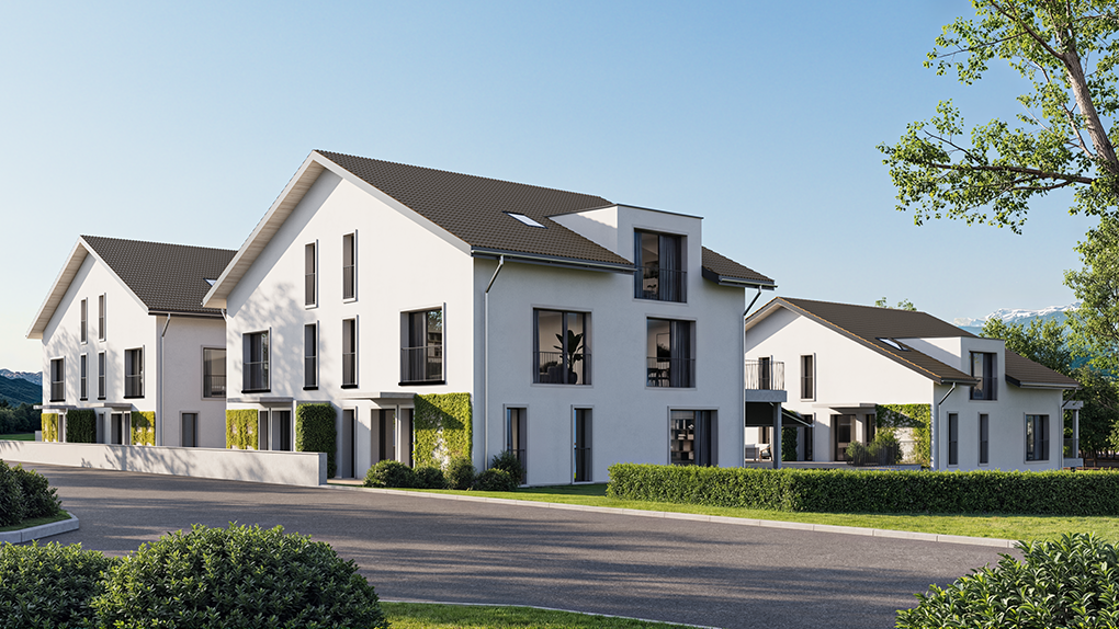 Moderne Wohnsiedlung mit weißen Doppelhäusern