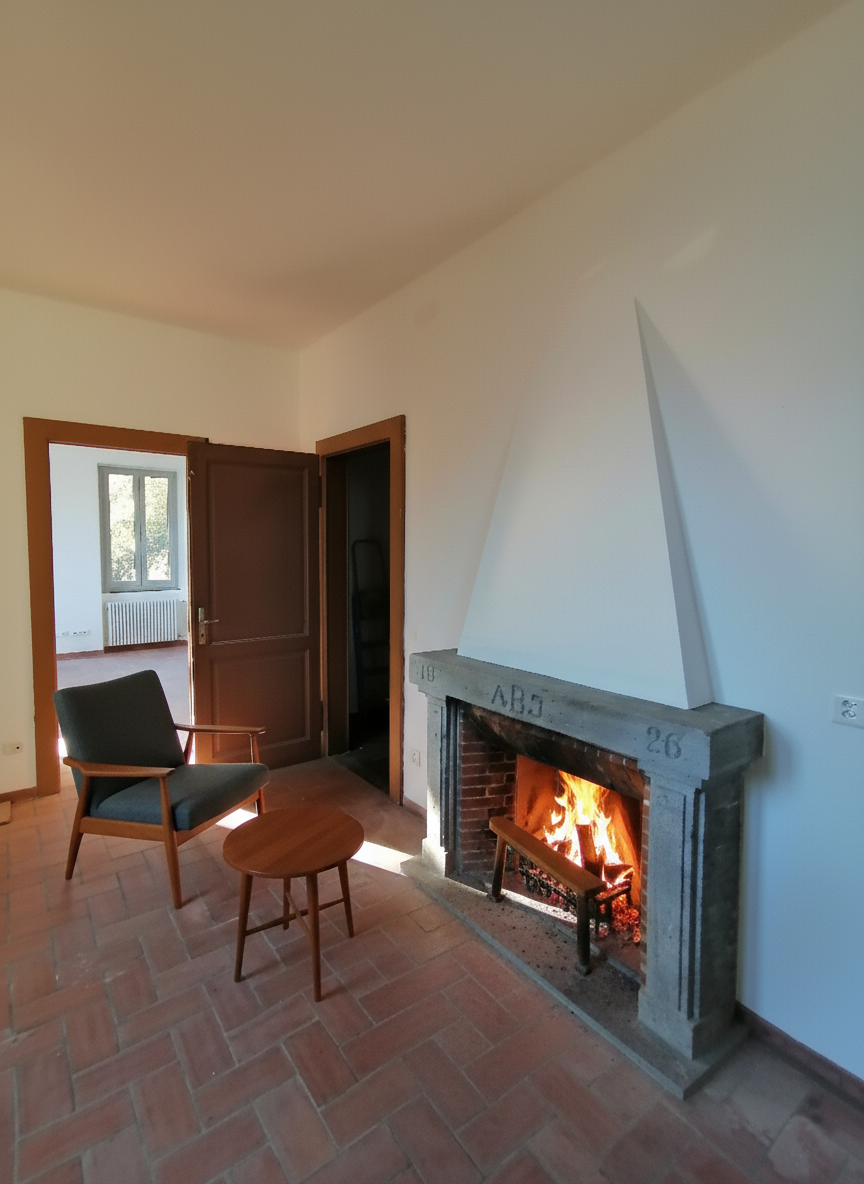 Wohnzimmer mit Kamin
